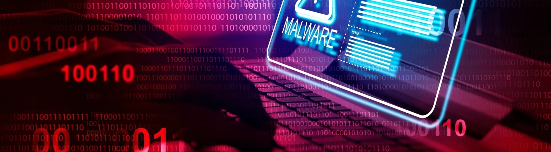 Alerta digital de malware parpadeando sobre el teclado de una computadora portátil con fondo de datos binarios, ilustrando la vulnerabilidad informática y soluciones en ciberseguridad para pequeñas empresas