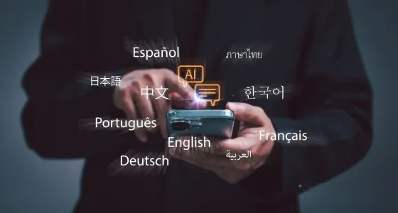 Celular con icono de IA e idiomas en pantalla, uso de inteligencia artificial en la enseñanza de idiomas